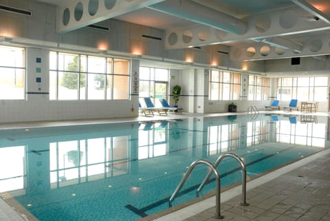 Indoor pool, sun loungers
