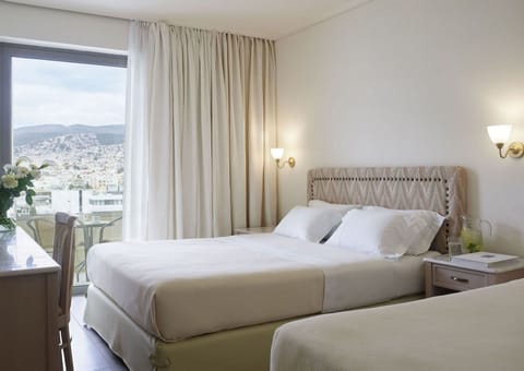 Classic Double Room with Extra Bed Side Sea View | Premium bedding, in-room safe, desk, blackout drapes