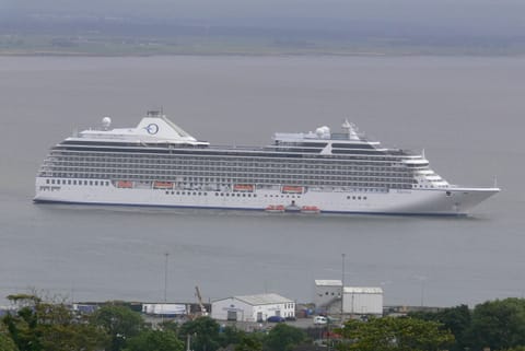 CRUISE SHIP ANCHORED OFF THE HARBOUR