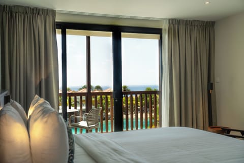 Deluxe Room, Ocean View | In-room safe, desk, laptop workspace, soundproofing