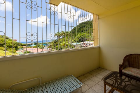 Basic Single Room, 1 King Bed, Kitchenette, Sea View | Terrace/patio