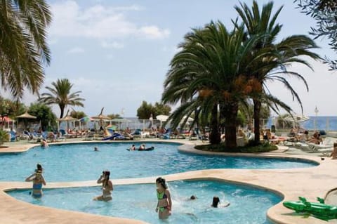 Outdoor pool, open 10:00 AM to 6:00 PM, pool umbrellas, sun loungers