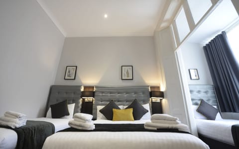 Quadruple Room | Select Comfort beds, in-room safe, desk, soundproofing
