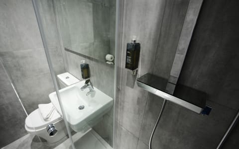 Shower, hydromassage showerhead, designer toiletries, hair dryer