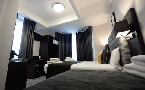 Triple Room | Select Comfort beds, in-room safe, desk, soundproofing
