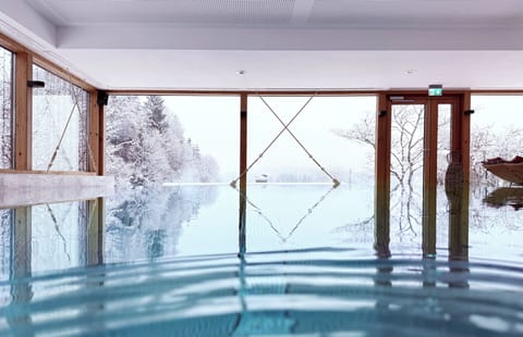 Indoor pool, open 7:30 AM to 11:30 PM, sun loungers
