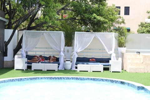 Outdoor pool, pool umbrellas, sun loungers