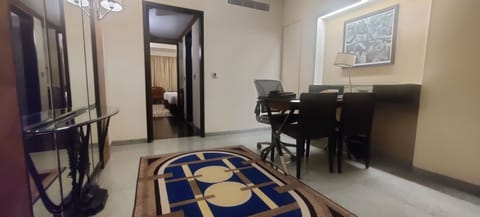 Executive Suite, 1 Double Bed | Living area | Flat-screen TV