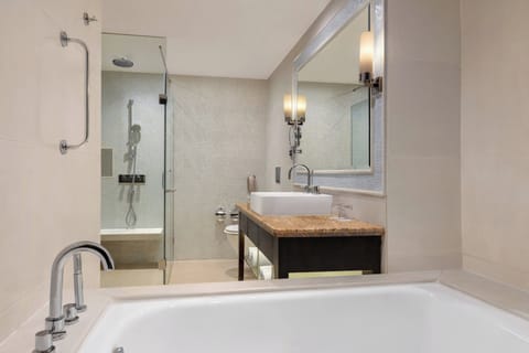 Separate tub and shower, deep soaking tub, free toiletries, hair dryer