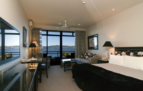 Junior Suite King with Lake View | Premium bedding, in-room safe, individually furnished, desk