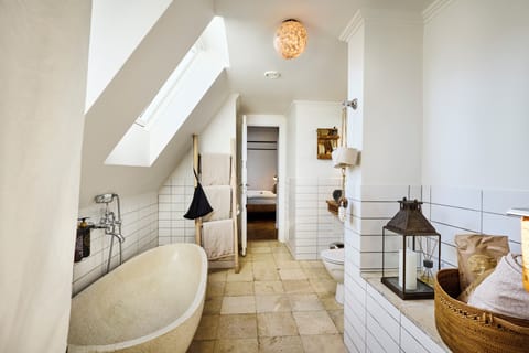 Panoramic Penthouse, 1 Queen Bed, Hot Tub, City View | Bathroom | Designer toiletries, hair dryer, towels, soap