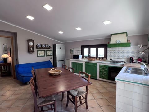 Villa | Private kitchen | Coffee/tea maker, highchair