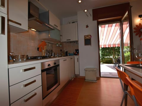 Villa | Private kitchen | Fridge, highchair, cookware/dishes/utensils