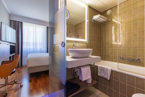 Room (Individual) | Bathroom | Rainfall showerhead, eco-friendly toiletries, hair dryer, towels