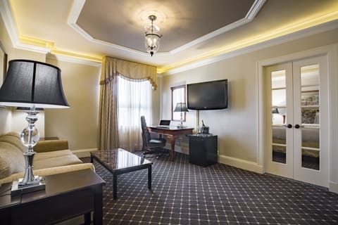 Main Street Double Suite | Living room | 42-inch LCD TV with digital channels, TV, iPod dock