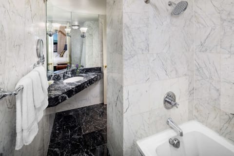 Preferred King | Bathroom | Combined shower/tub, designer toiletries, hair dryer, bathrobes