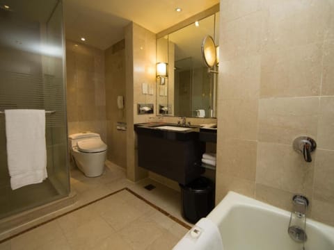 Separate tub and shower, deep soaking tub, eco-friendly toiletries