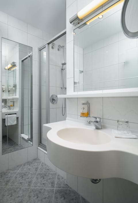 Classic Single Room | Bathroom | Shower, hair dryer, bathrobes, towels