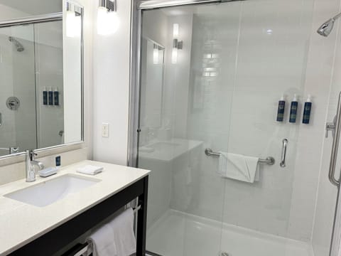 Room, 2 Queen Beds | Bathroom | Shower, free toiletries, hair dryer, towels