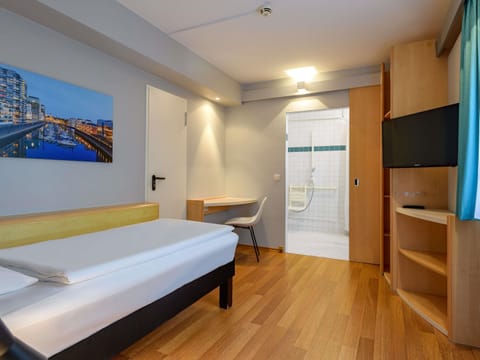 Desk, blackout drapes, soundproofing, iron/ironing board