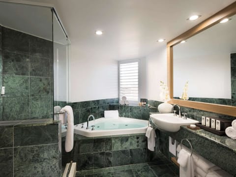 Separate tub and shower, deep soaking tub, designer toiletries