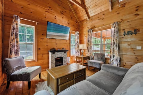 Snuggle up by the fireplace and enjoy a Smart TV after a day exploration.