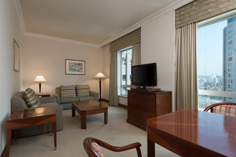 Club Suite, 1 Bedroom | Living area | 32-inch LCD TV with cable channels, TV, DVD player