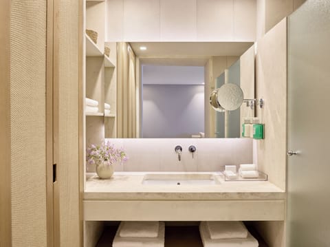 Eco-friendly toiletries, hair dryer, towels, soap