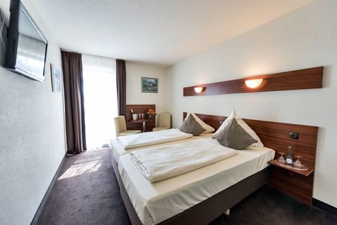 Twin Room, 2 Twin Beds | In-room safe, iron/ironing board, cribs/infant beds, free WiFi