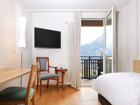 Single Room, Balcony, Mountain View (Jungfrau) | Minibar, in-room safe, individually decorated, individually furnished