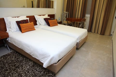 Deluxe Room | Premium bedding, in-room safe, individually decorated