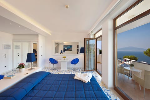 Royal Suite, Hot Tub, Sea View | Minibar, in-room safe, desk, free WiFi