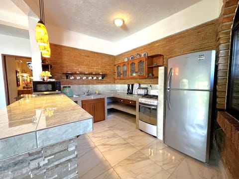 Apartment, 2 Bedrooms | Private kitchen | Full-size fridge, microwave, oven, stovetop