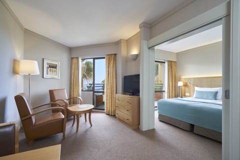 Junior Suite, Garden View | In-room safe, desk, blackout drapes, iron/ironing board