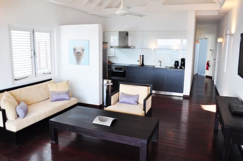 Two Bedroom Apartment Ocean View | Living room | 50-inch TV with cable channels