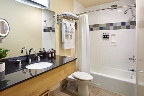 Combined shower/tub, designer toiletries, hair dryer, bathrobes