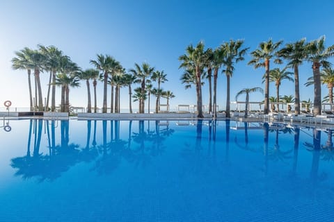 Indoor pool, 2 outdoor pools, pool umbrellas, sun loungers