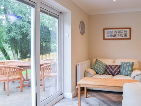 Welcoming living area | Lucy’s at the Grange - Grange Country House Holiday Cottages, Loweswater, near Cockermouth