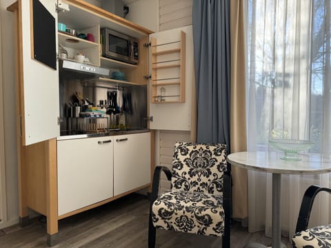 Studio, Ground Floor | Minibar, in-room safe, blackout drapes, iron/ironing board
