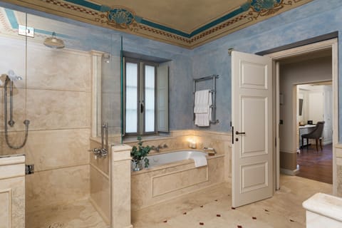 Doppia Prestige | Bathroom | Designer toiletries, hair dryer, bathrobes, slippers