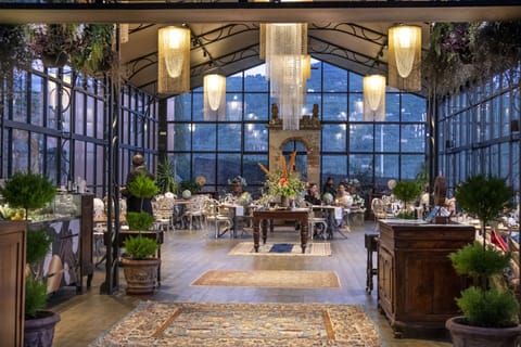 Breakfast, lunch, dinner served; Italian cuisine, garden views 