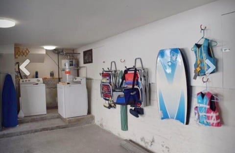 Garage with 6 beachchairs, boogie boards, SUP and 2 bicycles STR15-0329