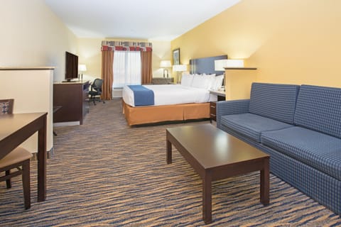 Suite, 1 King Bed | In-room safe, blackout drapes, iron/ironing board, free rollaway beds