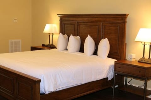 King Room (Suite located on North Grove Street) | Premium bedding, in-room safe, individually decorated