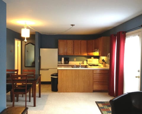 Large Family Suite, 2 Bedrooms, 1.5 Baths | Private kitchen | Fridge, microwave
