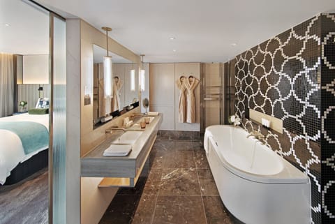 Jewel City Suite | Bathroom | Shower, rainfall showerhead, designer toiletries, hair dryer