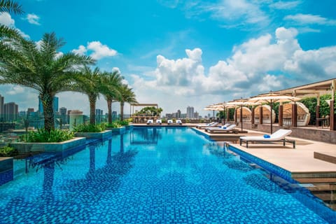 Outdoor pool, free cabanas, pool umbrellas