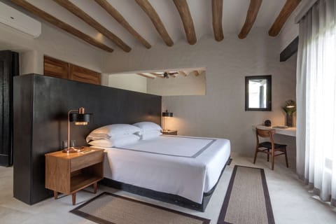 Suite, 2 Bedrooms, Lagoon View (Lagoon) | 1 bedroom, premium bedding, minibar, in-room safe