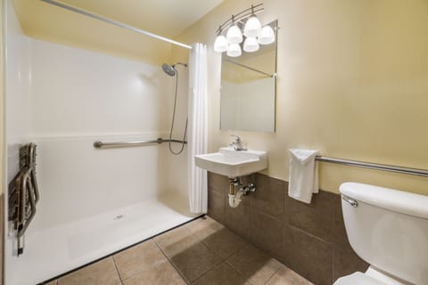 Combined shower/tub, hair dryer, towels, soap