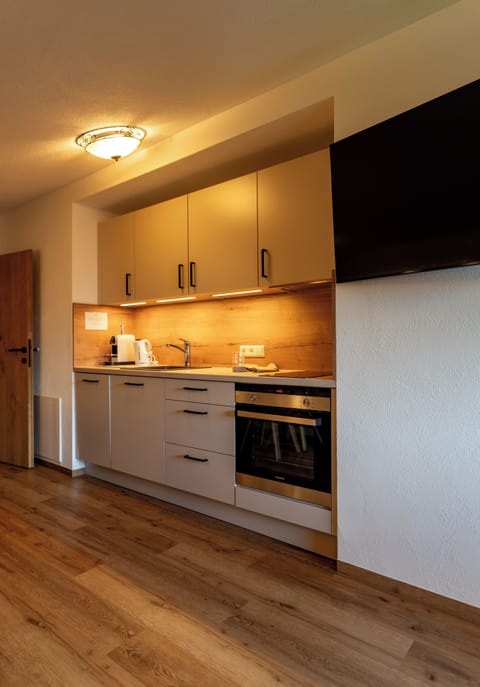 Exclusive Condo, 2 Bedrooms, Garden Area | Private kitchen | Full-size fridge, microwave, stovetop, dishwasher